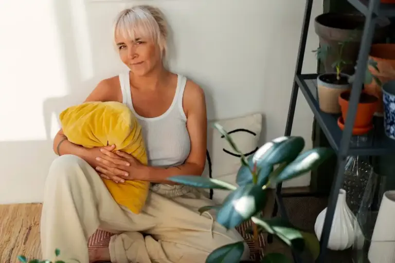 Dutch senior woman relaxed at home, cleaning supplies ignored