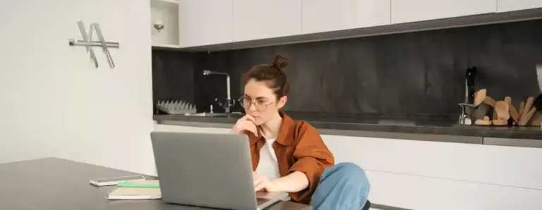 Dutch person performing laptop maintenance at home