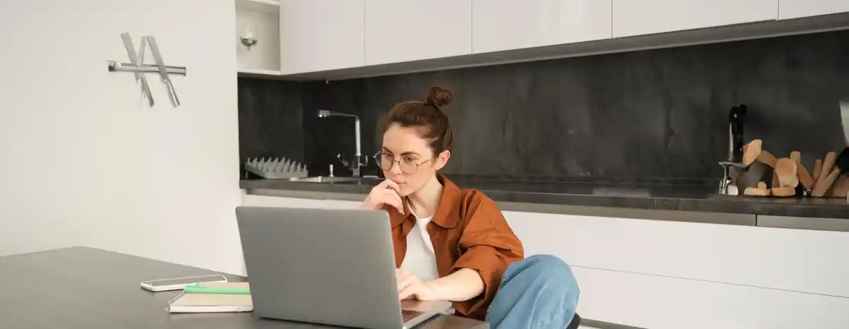 Dutch person performing laptop maintenance at home