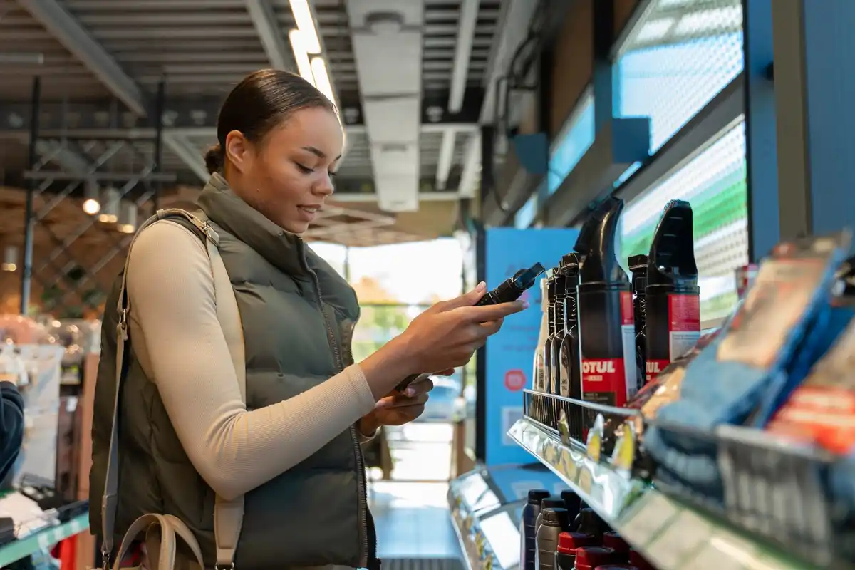 Dutch traveler using refill station at airport