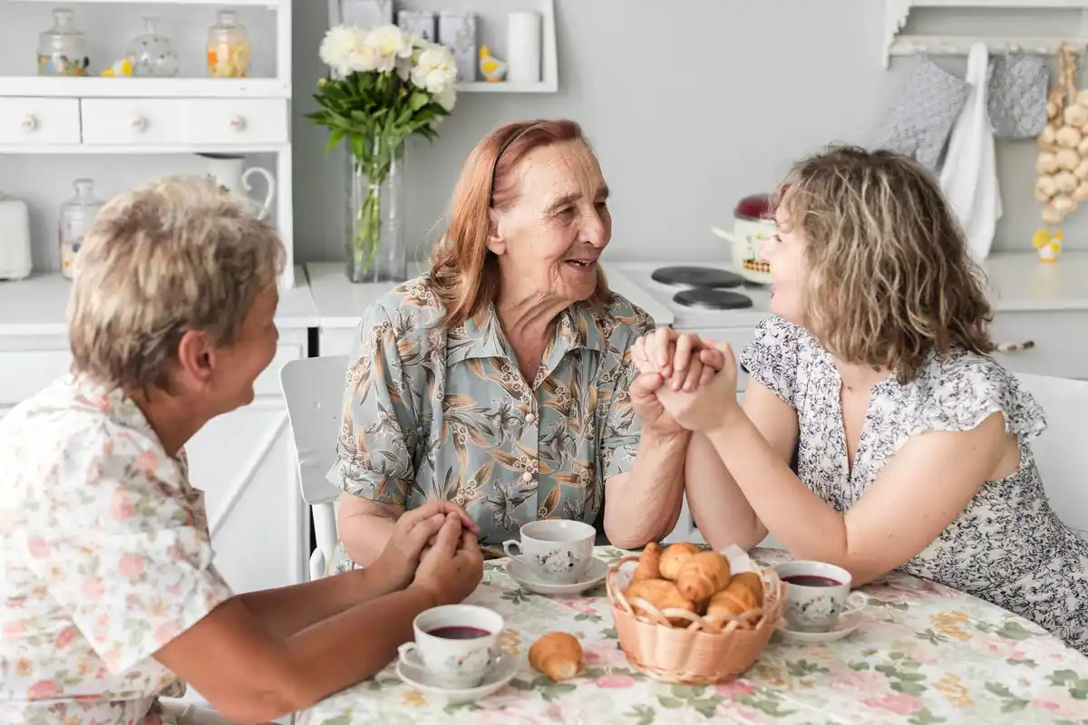 Dutch friends joking criticism party table