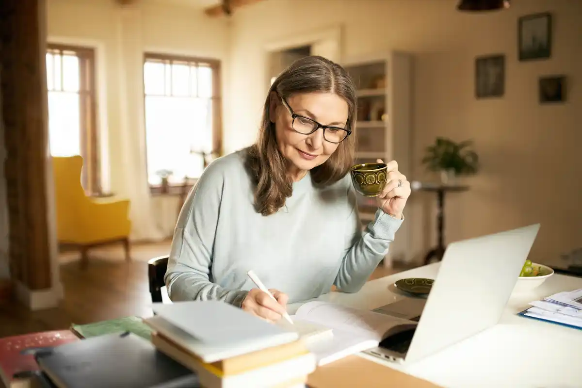 dutch student studying notebook desk coffee