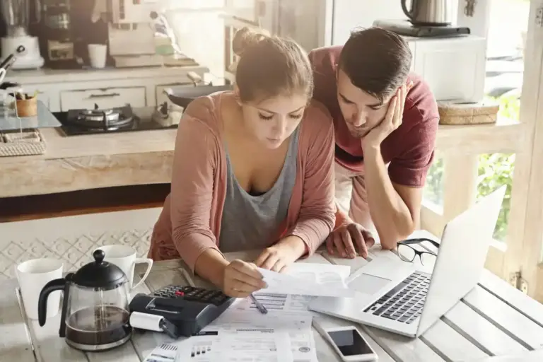 dutch family checking energy bill