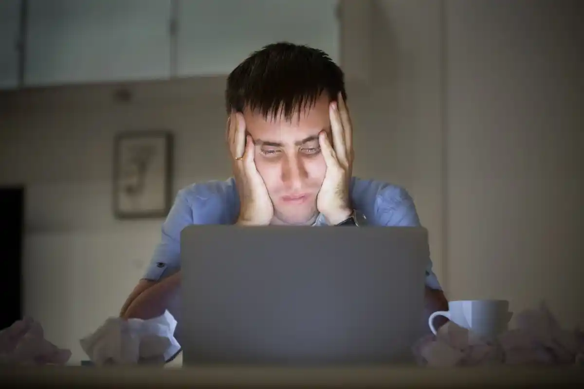 stressed person overwhelmed by productivity apps