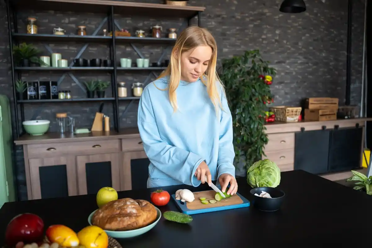 funny person goggles cutting onion modern kitchen
