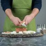 chef adding spices closeup netherlands