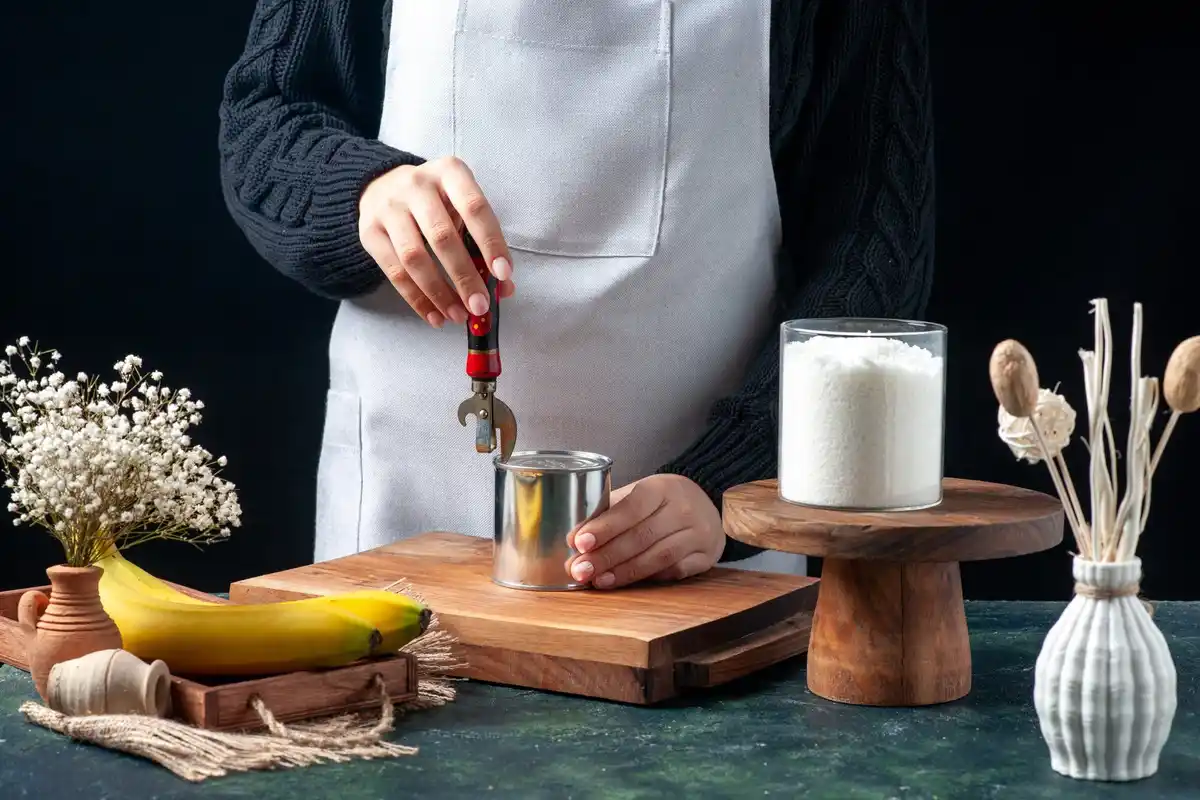 chef adding spices in restaurant kitchen closeup