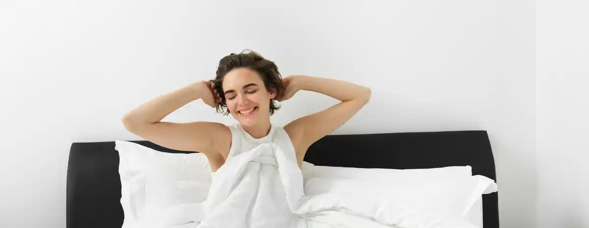 morning stretching in bed, dutch bedroom, sleepy person