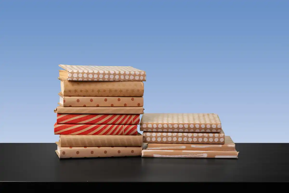 stack of old Dutch textbooks recycling reuse study