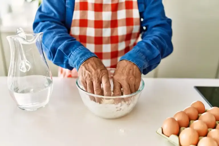 dutch grandma making pancakes in cozy kitchen