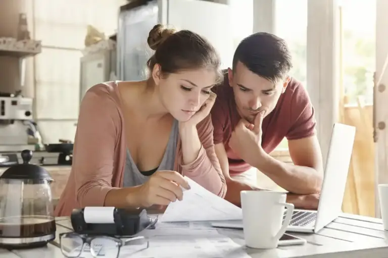 dutch couple planning finances at home
