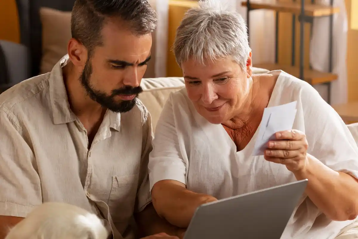 dutch middle aged couple budgeting home finances