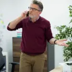 Dutch office worker overwhelmed multitasking