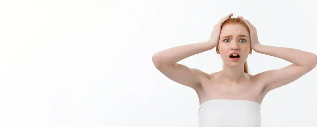 woman confused skin care products Dutch bathroom