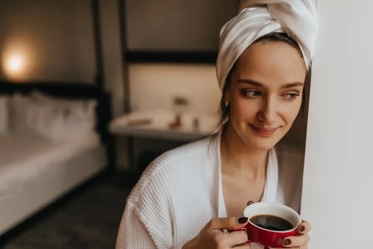 Dutch woman washing face natural light morning
