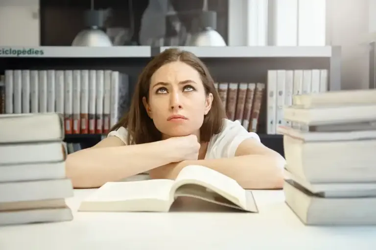 tired Dutch student studying library