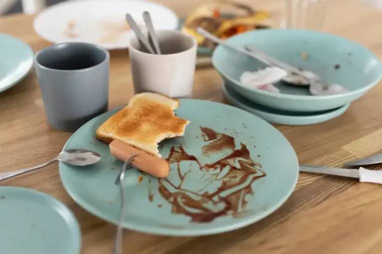 dirty microwave with leftover food