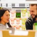 dutch people paying with cash in supermarket
