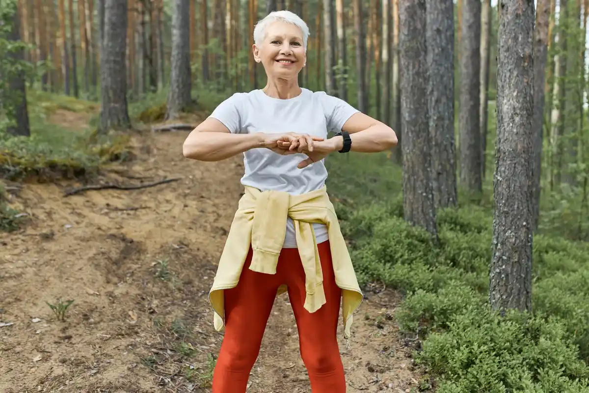 active elderly using smartwatch outdoors Netherlands