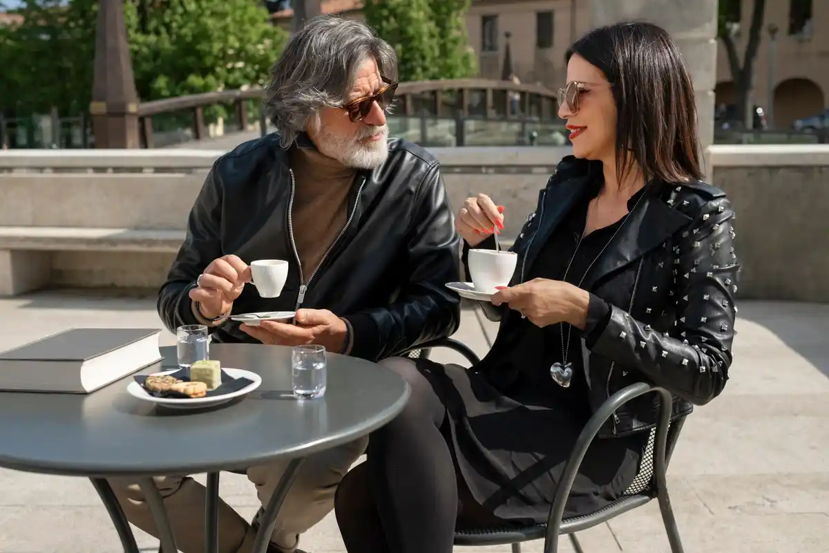 dutch mature people talking at cafe