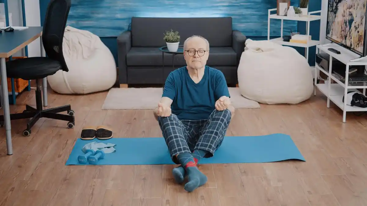 man wearing old sneakers at home relaxed posture