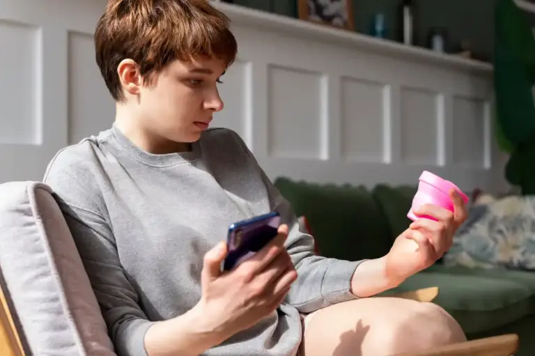 Dutch person using savings app, financial app interface, euro coins