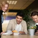 Dutch office people multitasking tablets smartphones