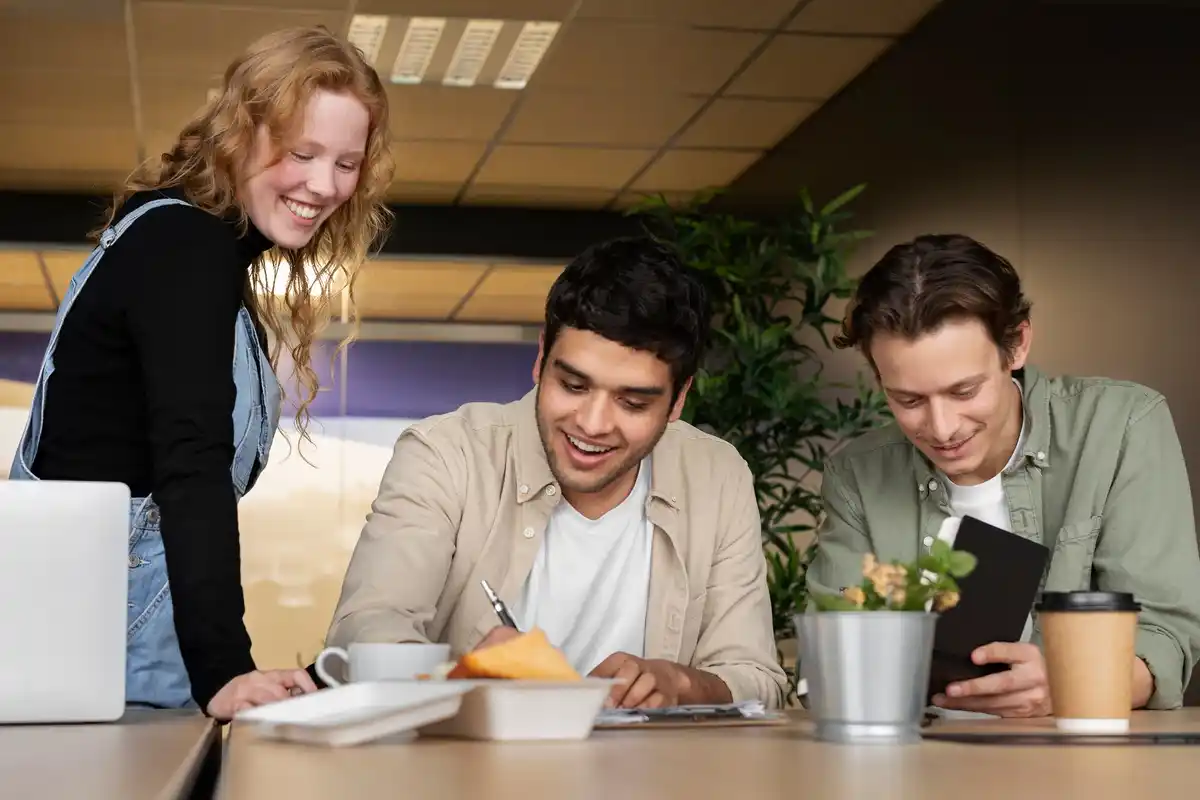 Dutch office people multitasking tablets smartphones