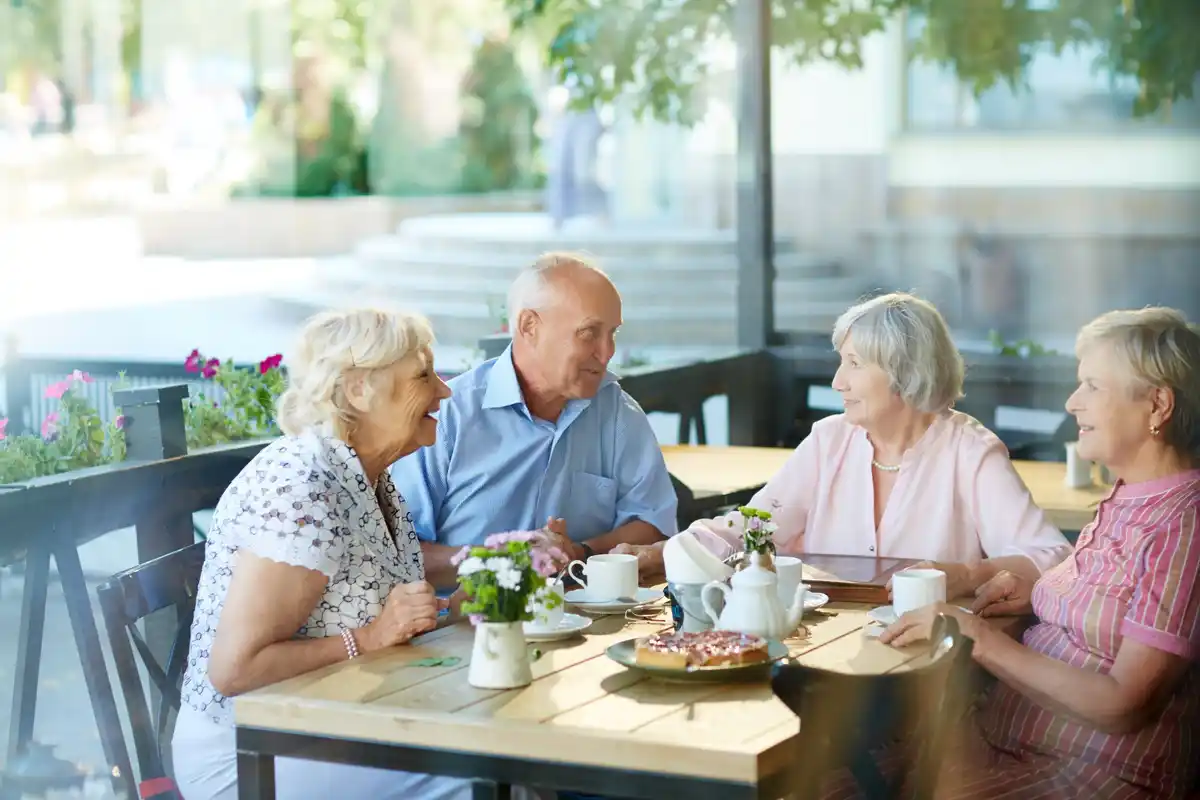 elderly people group conversation friendly