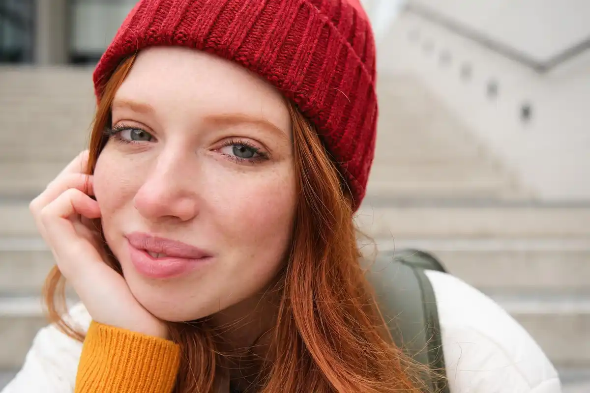 Dutch minimal makeup young woman real freckles fresh skin Amsterdam