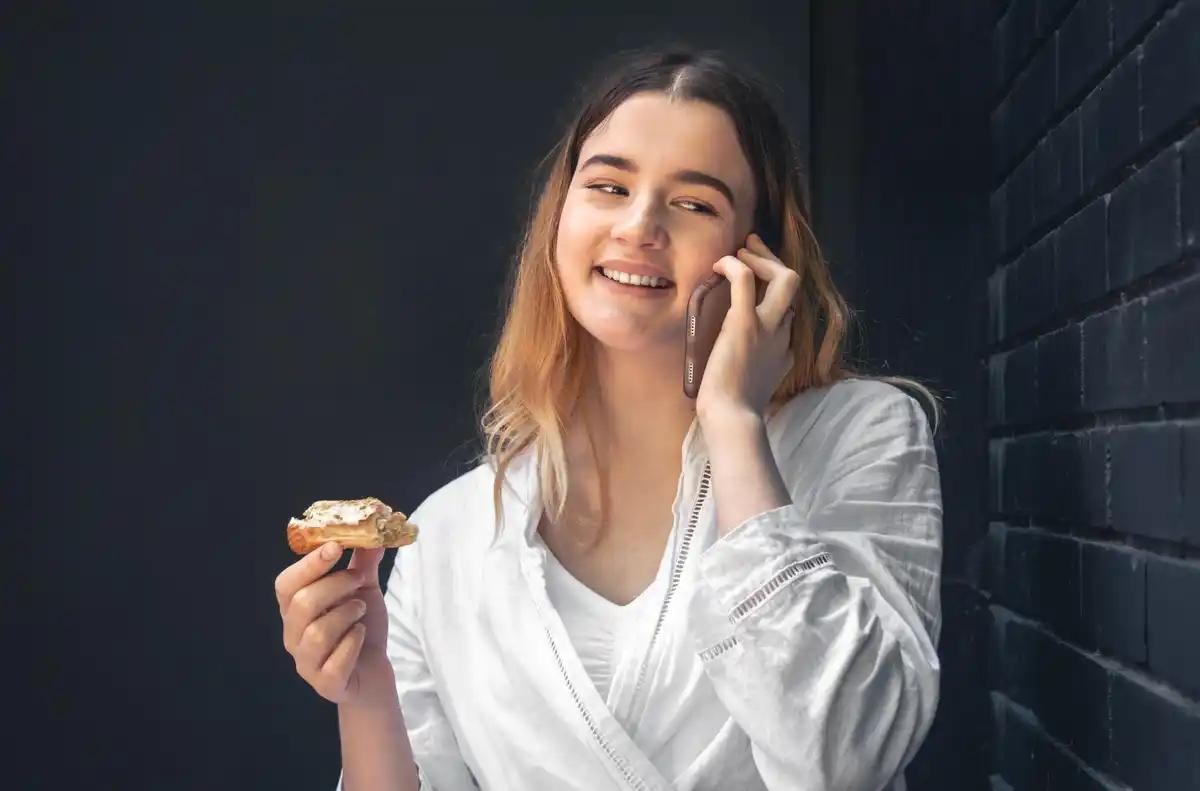 woman gently removing makeup at night routine