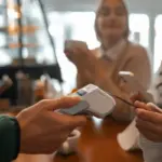 dutch person paying contactless terminal