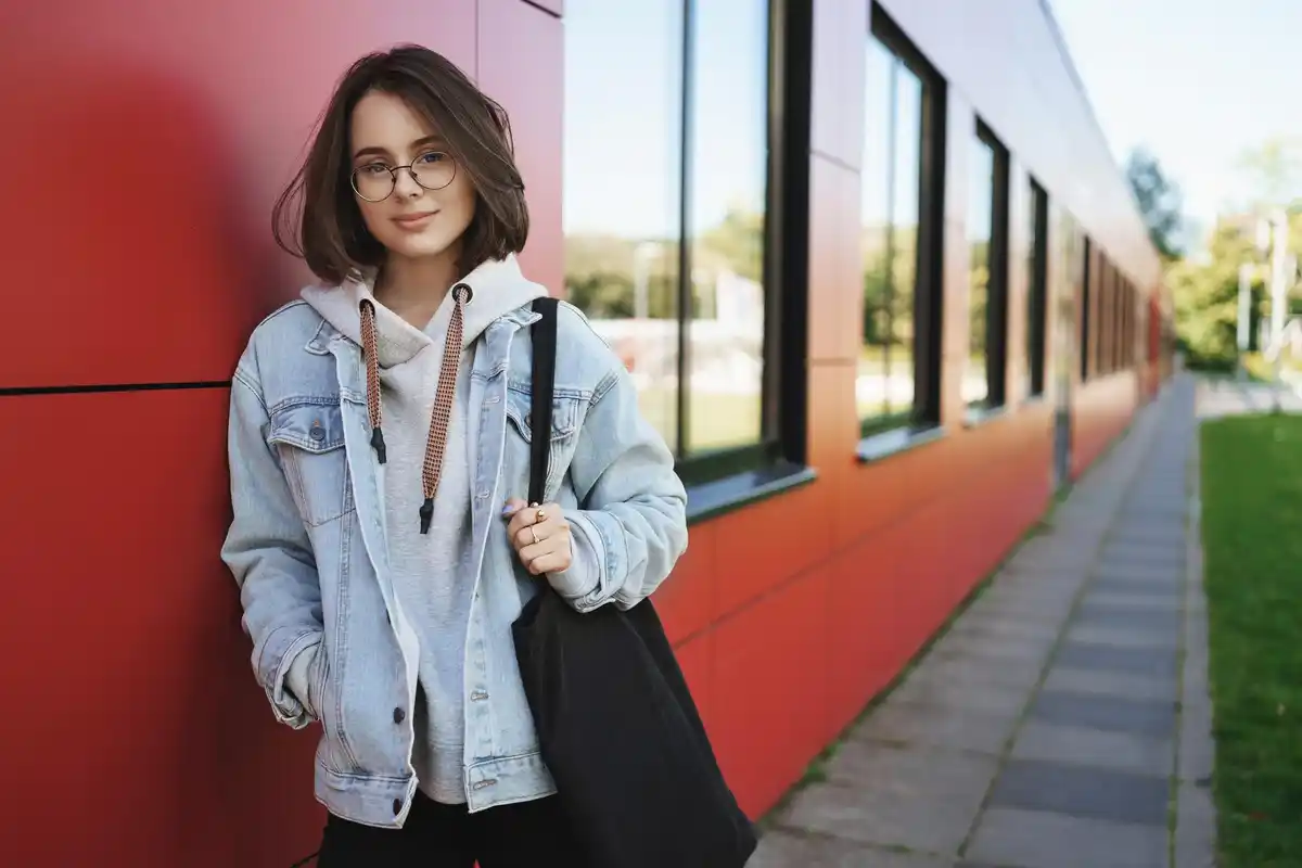 Dutch students travelling by train with backpacks