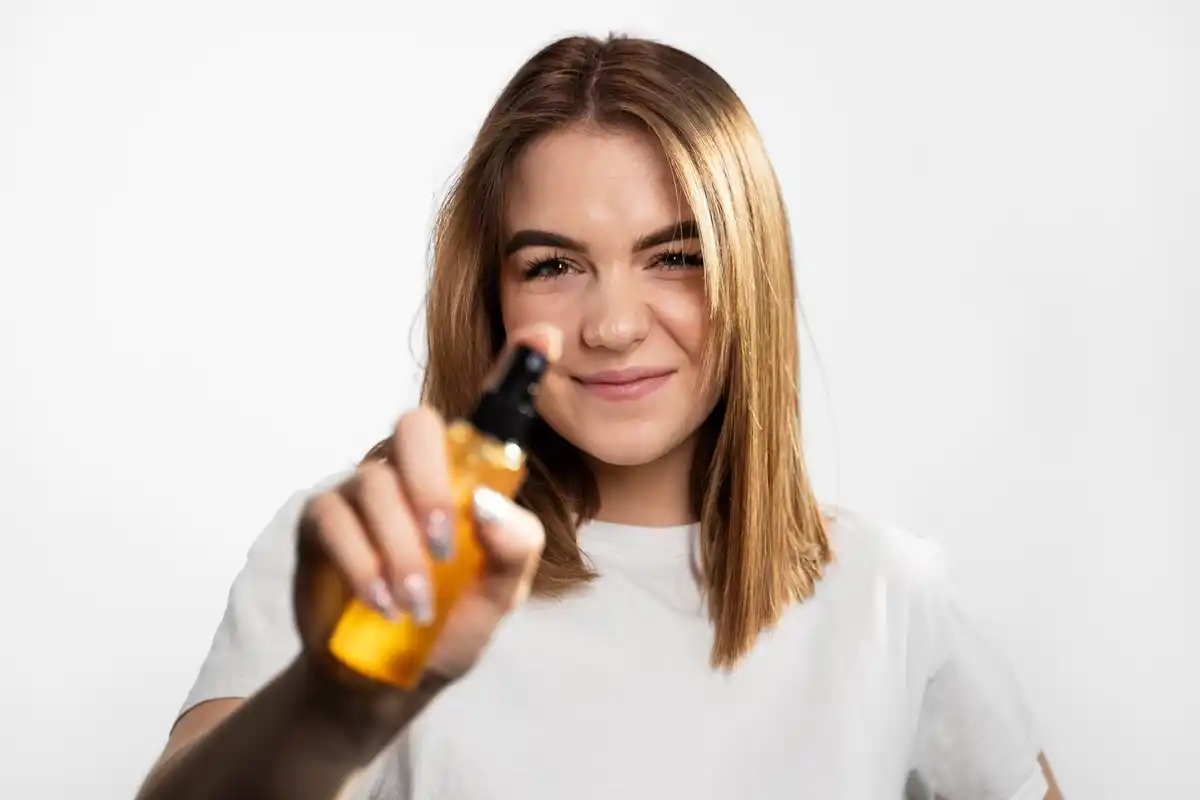 Dutch woman applying olive oil to her face skincare natural