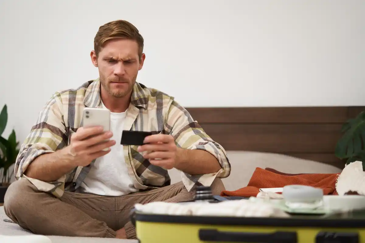 worried dutch man phone banking app
