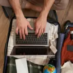 airport wifi hacker danger traveler laptop