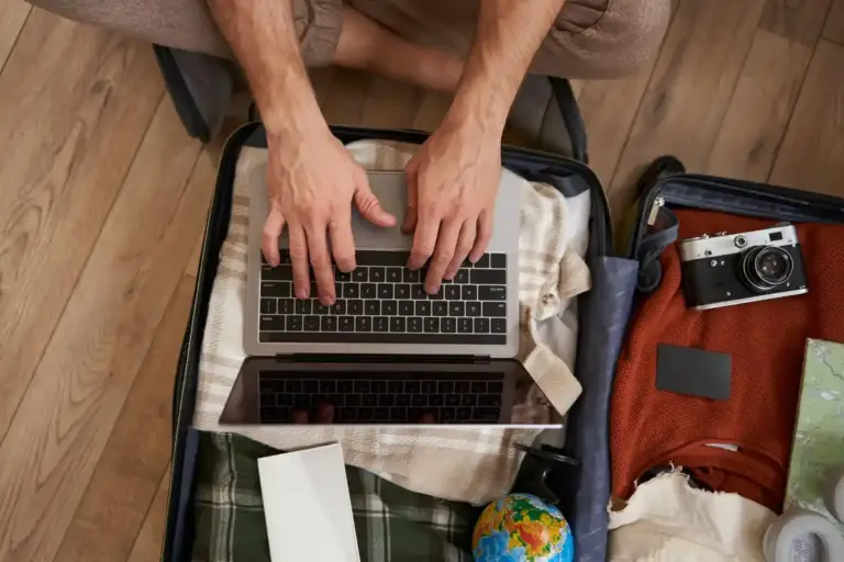 airport wifi hacker danger traveler laptop