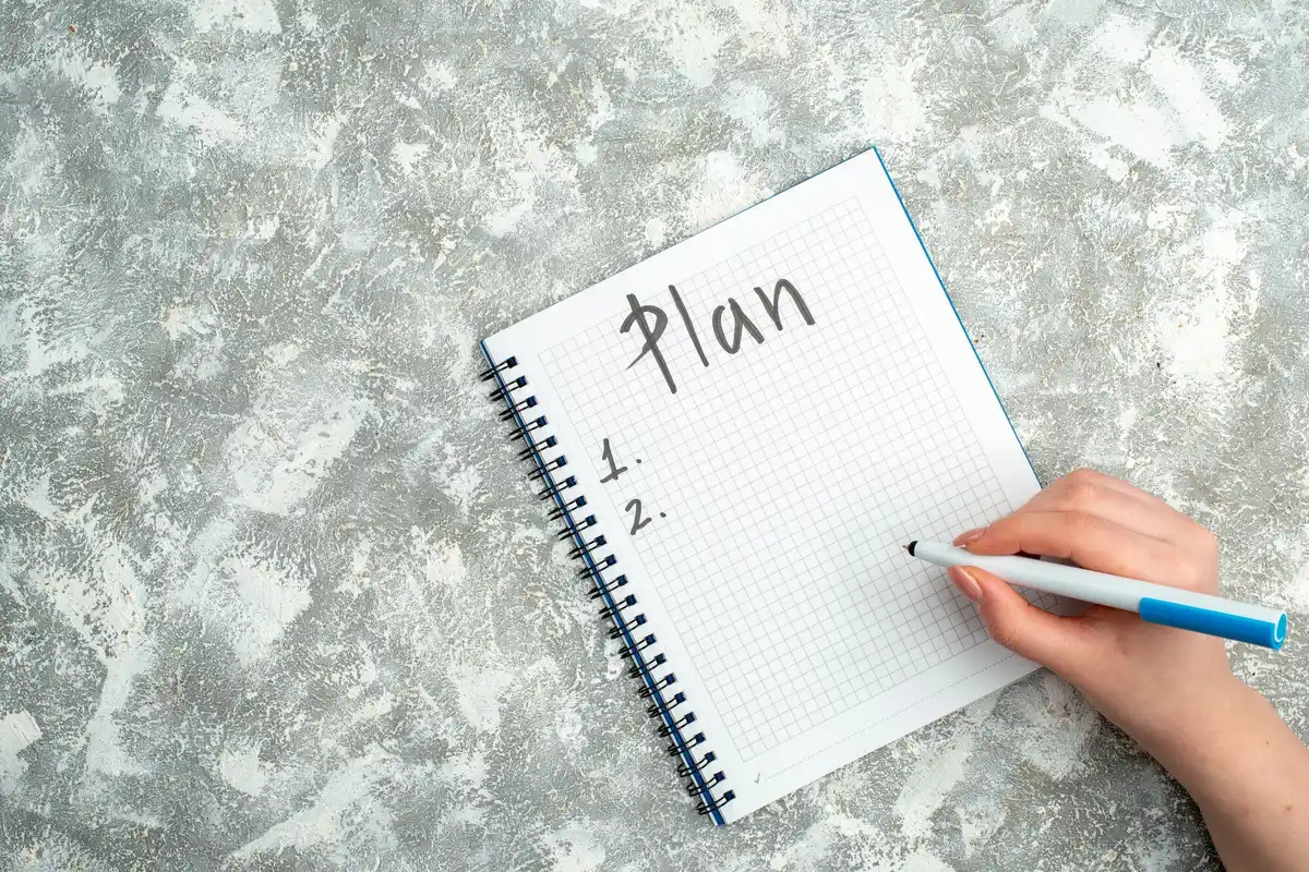 handwritten time tracking notes dutch desk