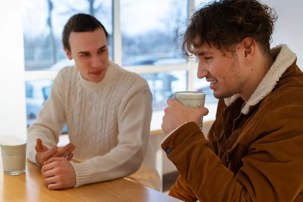 colleagues coffee break reconciliation emotions